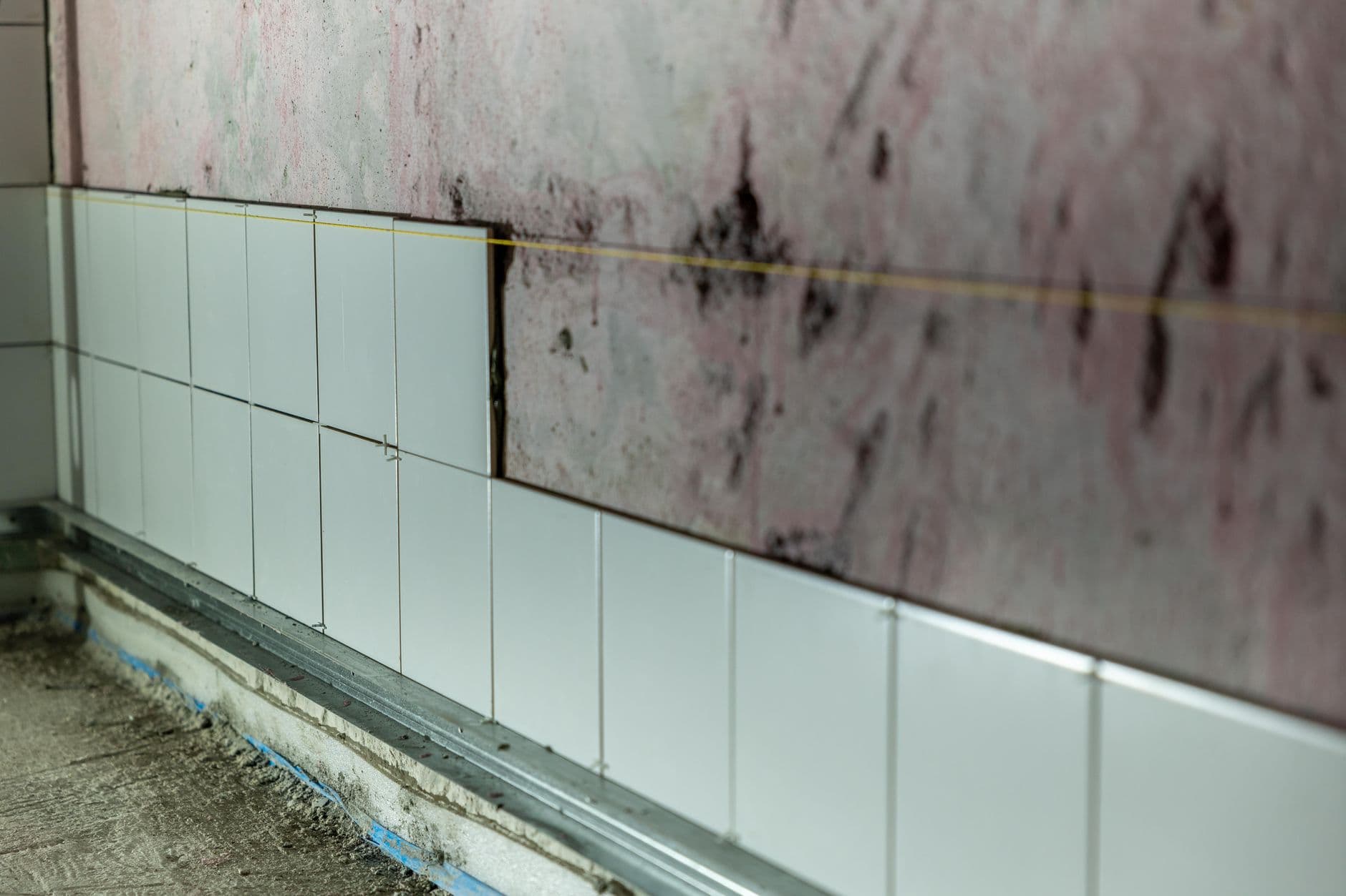Wall damage from hidden water leak showing the type of deterioration that occurs behind drywall
